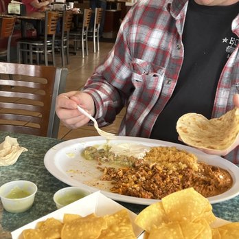 Taqueria El Carnaval - a man eating at a restaurant - Mexican Near Me - Placerville, California Taqueria El Carnaval - a man eating at a restaurant - Mexican Near Me - Placerville, California