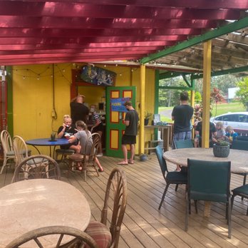 Sweet Tooth Shave Ice - a woman and a child sitting at a table - Shaved Ice Near Me - Kapaau, Hawaii Sweet Tooth Shave Ice - a woman and a child sitting at a table - Shaved Ice Near Me - Kapaau, Hawaii
