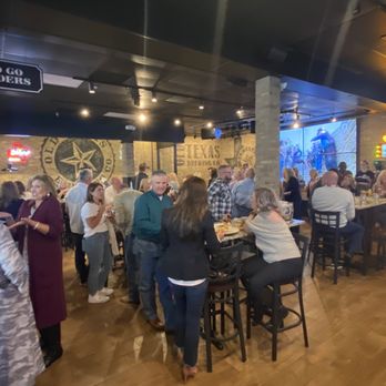 Old Texas Brewing - a large group of people sitting at tables - Bars Near Me - Fort Worth, Texas Old Texas Brewing - a large group of people sitting at tables - Bars Near Me - Fort Worth, Texas