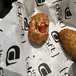 The Draft Sports Bar & Grill - The "jalapeño" peppers which are red peppers.
