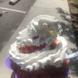 Nannie Mac’s Snowballs - Stuffed sugar free strawberry cheesecake with added whipped cream in a flower cup