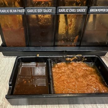 Boiling Point - Sauces on the table - Comfort Food Near Me - Garden Grove, California