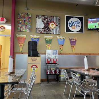 Spicy Pie - tables and chairs in a restaurant - Pizza Near Me - Minot, North Dakota Spicy Pie - tables and chairs in a restaurant - Pizza Near Me - Minot, North Dakota
