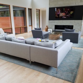 Kenwood Floors - a large living room with a fireplace - Flooring Near Me Kenwood Floors - a large living room with a fireplace - Flooring Near Me