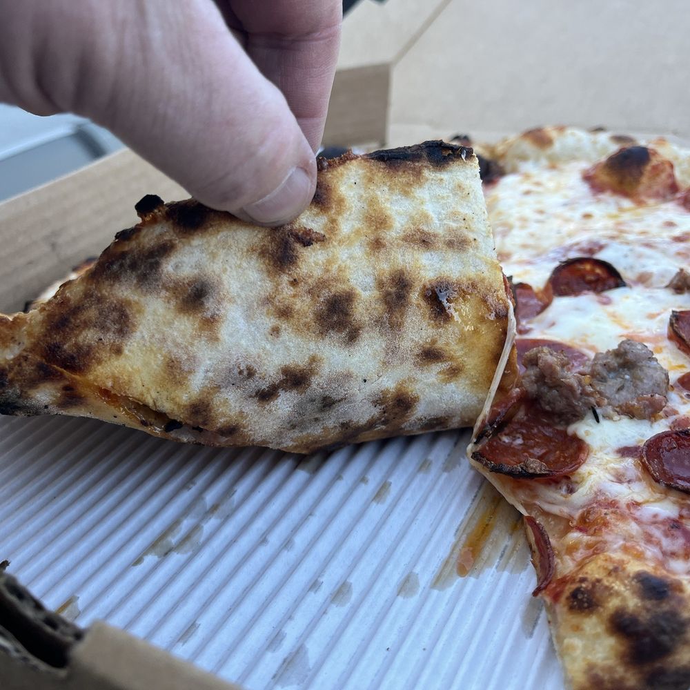 Two Doughs Pizza - Undercarriage. Nice bake - Caterers Near Me - Agoura Hills, California Two Doughs Pizza - Undercarriage. Nice bake - Caterers Near Me - Agoura Hills, California