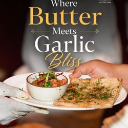 Roti Grill - Craving garlic naan in Victory Park?
Head to ROTI GRILL for buttery, aromatic perfection--freshly baked and best paired with your favorite.