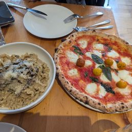Mushroom pappardelle pasta and margarita pizza Mushroom pappardelle pasta and margarita pizza