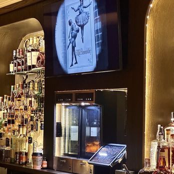 Red Phone Booth - Amazing elegance at the bar - Cigar Bars Near Me - Miami, Florida