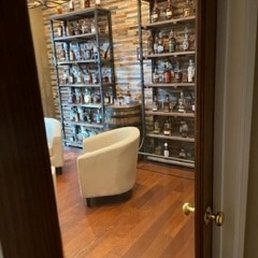 Glass door to the bourbon/wine room.