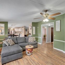 EXIT Realty Group - Our awesome new living room and kitchen.