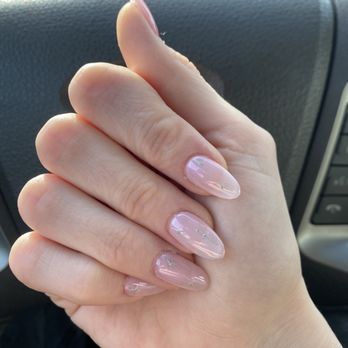 Hollywood Nails & Spa - Purple Pearl essence over #010 w/ star design, short almond shape. - Waxing Near Me - Portland, Oregon