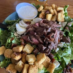 Brewgards Liquor and Lounge - Flat Iron Steak Salad with Blue Cheese dressing. Ask for purple onions and bacon for a better taste