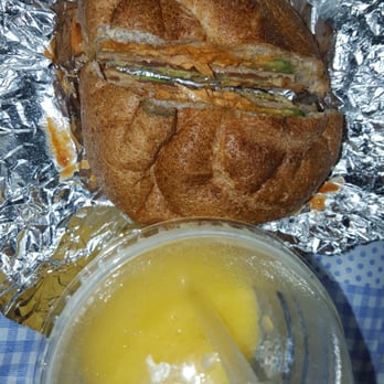 Ahmani’s Jus Juice - Salmon Sandwich with Avacado and Mango Madness juice - Juice Bars & Smoothies Near Me - Brooklyn, New York Ahmani’s Jus Juice - Salmon Sandwich with Avacado and Mango Madness juice - Juice Bars & Smoothies Near Me - Brooklyn, New York
