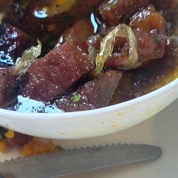 Raices Urbano - Pork Chunks with onions and an amazing sauce + yellow rice & beans - Caribbean Near Me - San Juan, Puerto Rico Raices Urbano - Pork Chunks with onions and an amazing sauce + yellow rice & beans - Caribbean Near Me - San Juan, Puerto Rico