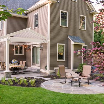 Concord Tree and Landscape - a patio with a fire pit - Landscaping Near Me - Acton, Massachusetts