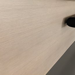 Cabinet front sprayed with Dunn Edwards Old Masters Armor Flat. Turned out great.