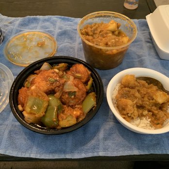 Curry District - Chilli Shrimp in the black bowl; Aloo Gobi and rice to the right. This is in its entirety, and enough for 2 separate meals. - Indian Near Me - Little Elm, Texas Curry District - Chilli Shrimp in the black bowl; Aloo Gobi and rice to the right. This is in its entirety, and enough for 2 separate meals. - Indian Near Me - Little Elm, Texas