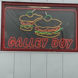 a neon sign for a gallery boy a neon sign for a gallery boy