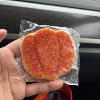 Sprinkle Splash Sweet Shoppe - a hand holding a cookie - Bakeries Near Me - New York, New York Sprinkle Splash Sweet Shoppe - a hand holding a cookie - Bakeries Near Me - New York, New York