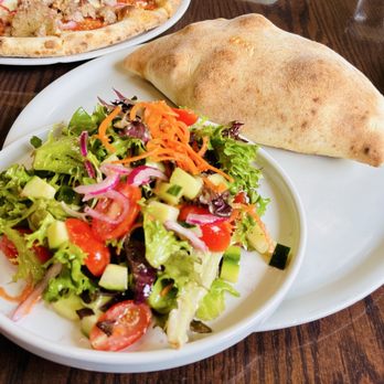 Gusto Handcrafted Pasta & Pizza - Meatball Calzone with a salad - Pasta Shops Near Me - Seaside, California Gusto Handcrafted Pasta & Pizza - Meatball Calzone with a salad - Pasta Shops Near Me - Seaside, California