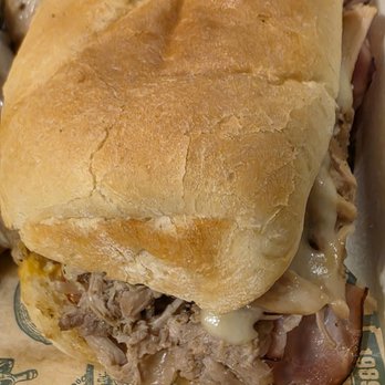 McAlister's Deli - Tangy Pulled Pork, Black Forest Ham, and Swiss with Yellow Mustard and Pickles served on Toasted Baguette. The Cuban Sandwich. - Delis Near Me - Roanoke, Virginia McAlister's Deli - Tangy Pulled Pork, Black Forest Ham, and Swiss with Yellow Mustard and Pickles served on Toasted Baguette. The Cuban Sandwich. - Delis Near Me - Roanoke, Virginia
