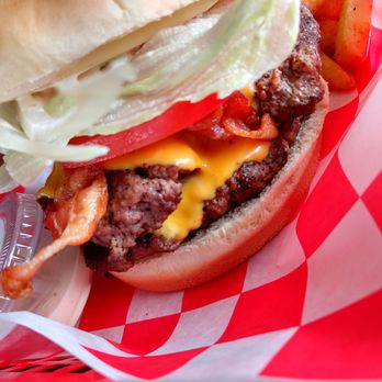 Black Meg 43 - a cheeseburger with bacon and lettuce - Burgers Near Me - Killeen, Texas Black Meg 43 - a cheeseburger with bacon and lettuce - Burgers Near Me - Killeen, Texas