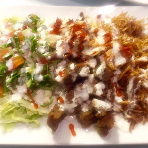 Photo of Zara Afghan Cuisine - Sacramento, CA, United States. Lamb and chicken over rice