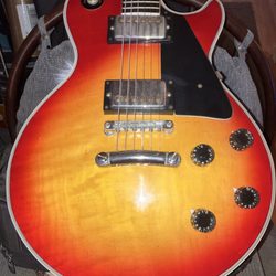 Cash America Pawn - Early 70s Gibson, Les Paul classic in Cherry Sunburst.