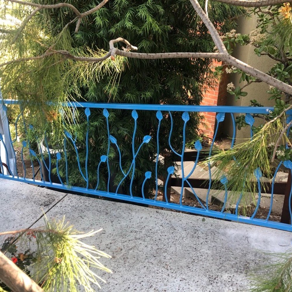 The new fence adjacent to a drop off.