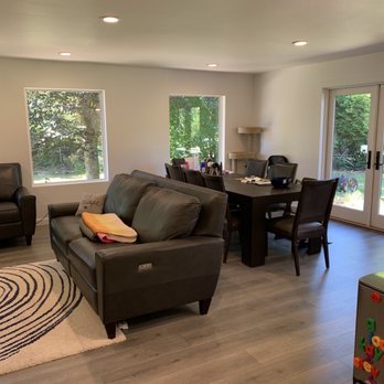 Cruz Construction & Renovation - After construction: new great room with large dining room instead of small nook with new window/doors/flooring and pushed out walls - General Contractors Near Me - Bothell, Washington Cruz Construction & Renovation - After construction: new great room with large dining room instead of small nook with new window/doors/flooring and pushed out walls - General Contractors Near Me - Bothell, Washington