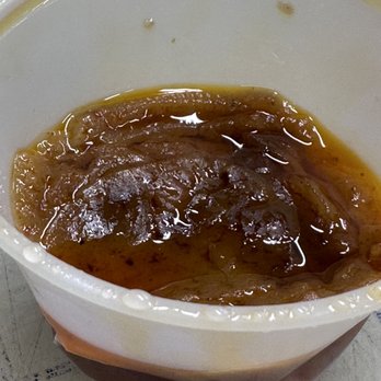 Asian Fusion Kitchen - Peanut sauce. Container was even looking like it was smashed or stored improperly. Bottom was crushed. - Barbeque Near Me - Maplewood, Minnesota