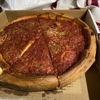 Chicago's Pizza  - Deep dish with sausage pepperoni, onions, jalapeño, and bell peppers. This is a medium y'all. - Pizza Near Me - San Antonio, Texas