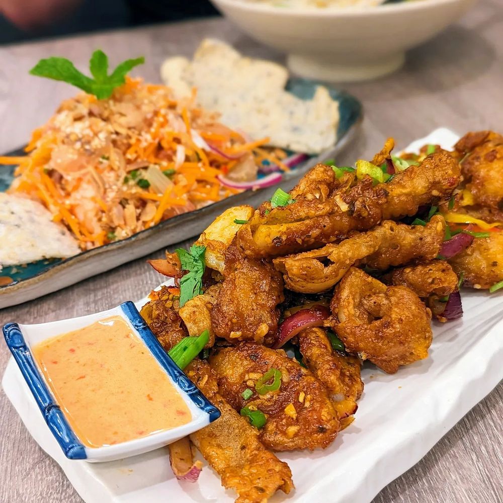 Hai Chi Em Modern Vietnamese Restaurant - large platter of fried chicken - Vietnamese Near Me - Vancouver, British Columbia Hai Chi Em Modern Vietnamese Restaurant - large platter of fried chicken - Vietnamese Near Me - Vancouver, British Columbia
