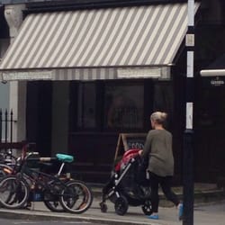 The Hairdressers - The outside front of the shop