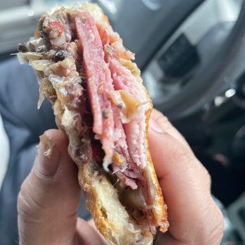 The Corner Kitchen - The muffuletta- plus added caramelized onions - SO GOOD!!!!! Flavor burst! - Delis Near Me - Dahlonega, Georgia