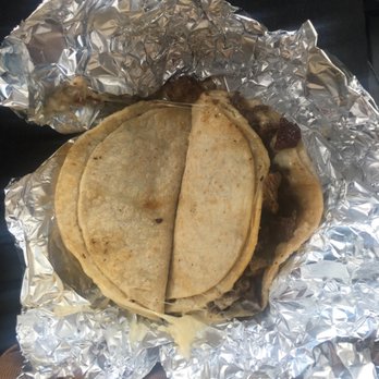 El Taconazo - Two quesadillas (picture taken in my car on my lap) - Tacos Near Me - Houston, Texas El Taconazo - Two quesadillas (picture taken in my car on my lap) - Tacos Near Me - Houston, Texas