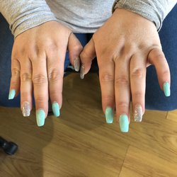Fancy Nails - Uneven, chipped shellac within a week, still had red from last time