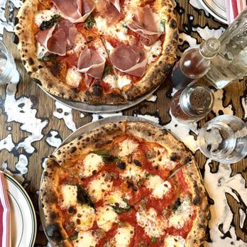 Roberta's - Margherita (I think!) with prosciutto (top) and sausage (bottom) - Pizza Near Me - Brooklyn, New York