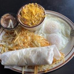 Grand Canyon Coffee And Cafe - Eggs, hash browns, salsa, green chili and a tortilla.