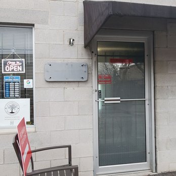 Hellbranch Hard Cider - a closed door and a bench - Cideries Near Me - Columbus, Ohio
