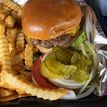 Beer Shed - Standard Cheese burger. Really good flavor. Texture was like meatloaf though when eating it. Fries were really good. - Bars Near Me - Riverview, Florida