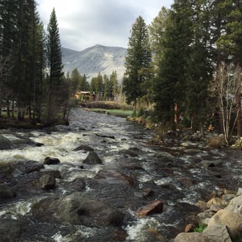The Rapids Lodge - The river right in the back of the lodge. - Hotels Near Me - Grand Lake, Colorado