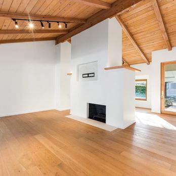Landa Builders - Fully remodeled living room, including flooring, lighting, tile work & fireplace. - General Contractors Near Me - Los Angeles, California