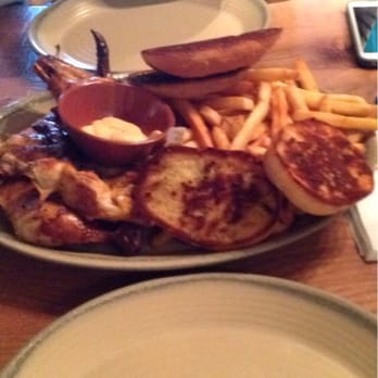 Nando's Peri-Peri - The full platter with mango lime chicken, fries, and garlic bread - Portuguese Near Me - Springfield, Virginia Nando's Peri-Peri - The full platter with mango lime chicken, fries, and garlic bread - Portuguese Near Me - Springfield, Virginia