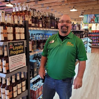 Macadoodles - a man in a store - Beer, Wine & Spirits Near Me - Osage Beach, Missouri Macadoodles - a man in a store - Beer, Wine & Spirits Near Me - Osage Beach, Missouri