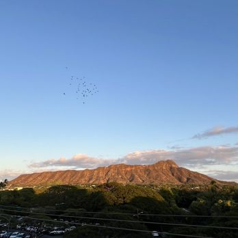 Deck. - Diamond Head view at sunset. - Hawaiian Near Me - Honolulu, Hawaii Deck. - Diamond Head view at sunset. - Hawaiian Near Me - Honolulu, Hawaii
