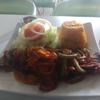 Cafe Rosa - Bistec platter with Puerto Rican rice and chickpeas and a fresh salad - Puerto Rican Near Me - Chicago, Illinois