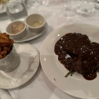 Chez Lévêque - Beef steak my hubby ordered was much tastier. However where are the veggies?!! - French Near Me - Outremont, Quebec