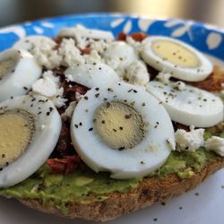 The Local Deli - Avocado Toast with added egg, feta and bacon