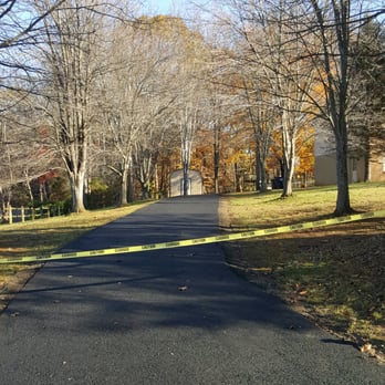 George Paving - a paved street with trees in the background - General Contractors Near Me - Stafford, Virginia